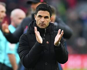 Liverpool v Arsenal 2022-23 Collection: Arsenal Manager Mikel Arteta Applauds Fans After Liverpool Showdown in Premier League