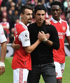 Arsenal Manager Mikel Arteta Celebrates with Fabio Vieira After Arsenal's Victory Against Tottenham Hotspur (2022-23)