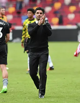 Arsenal Manager Mikel Arteta Celebrates with Fans after Brentford Victory, 2022-23 Premier League