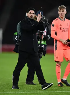 Arsenal Manager Mikel Arteta Celebrates with Fans after Europa League Victory over Rapid Wien