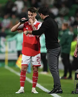 Sporting Lisbon V Arsenal 2022-23 Prints: Arsenal Manager Mikel Arteta Conferencing with Sporting CP's Fabio Vieira during Europa League Clash