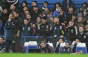 Arsenal Manager Mikel Arteta Conferring with Assistant Coach Albert Stuivenberg during Chelsea vs Arsenal, Premier League 2022-23