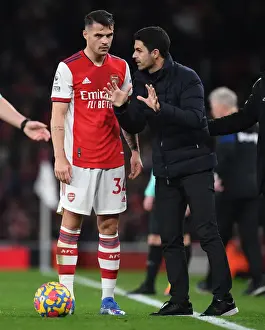 Arsenal V West Ham United 2021-22 Prints: Arsenal Manager Mikel Arteta Conferring with Granit Xhaka during Arsenal vs West Ham United