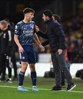 Images Dated 10th February 2022: Arsenal Manager Mikel Arteta Consults Kieran Tierney During Wolverhampton Match (2021-22)