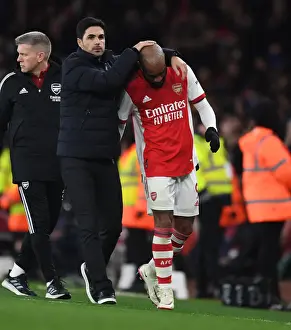 Arsenal V West Ham United 2021-22 Prints: Arsenal Manager Mikel Arteta Embraces Alex Lacazette in Emotional Moment during Arsenal vs West Ham United (2021-22)