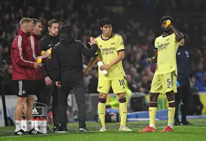 Arsenal Manager Mikel Arteta Gives Instructions to Tomiyasu and Partey during Brighton vs Arsenal Premier League Match