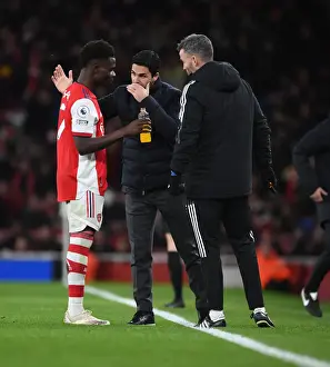Arsenal Manager Mikel Arteta Guides Bukayo Saka during Arsenal vs. Wolverhampton Wanderers, Premier League 2021-22