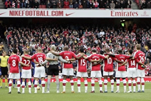 The Arsenal and Manchester players observe a minutes The Arsenal and Manchester players observe a minutes