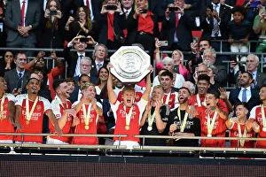 Arsenal: Martin Odegaard Lifts the Community Shield Trophy (2023-24)