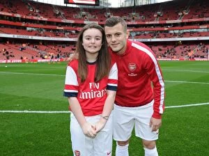 Images Dated 18th January 2014: Arsenal mascot with Jack Wilshere (Arsenal). Arsenal 2: 0 Fulham. Barclays Premier League