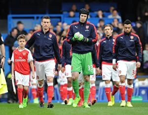 Images Dated 4th February 2017: Arsenal mascot with Laurent Koscielny and Petr Cech (Arsenal). Chelsea 3: 1 Arsenal