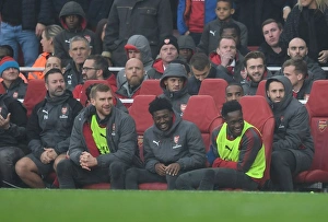 Arsenal: Mertesacker, Maitland-Niles, and Welbeck Share a Light-Hearted Moment Amidst Rivalry (Arsenal v Tottenham Hotspur, 2017-18)