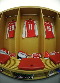 Arsenal V Stoke City 2014-15 Prints: Arsenal: Mesut Ozil's Empty Jersey in the Changing Room before Arsenal vs Stoke City (2014-15)