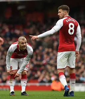 Arsenal Midfielders Jack Wilshere and Aaron Ramsey in Action against Stoke City, Premier League 2017-18
