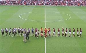 The Team Collection: The Arsenal and Newcastle team shake hands before the match