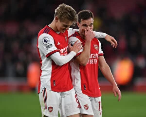 Arsenal v Leicester City 2021-22 Collection: Arsenal: Odegaard and Soares Share a Moment After Arsenal vs. Leicester City (2021-22)
