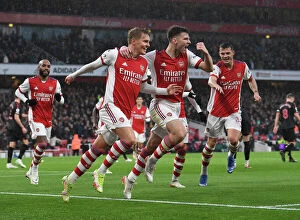 Images Dated 11th December 2021: Arsenal: Odegaard and Tierney's Celebration - 2 Goals Against Southampton (Premier League 2021-22)
