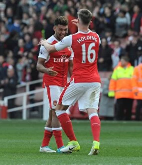 Images Dated 7th May 2017: Arsenal: Oxlade-Chamberlain and Holding Celebrate Victory Over Manchester United