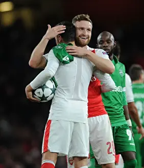 Arsenal: Ozil and Mustafi Embrace Victory After Arsenal FC vs. PFC Ludogorets Razgrad, UEFA Champions League (2016-17)