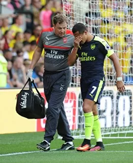 Images Dated 27th August 2016: Arsenal Physio Colin Lewin with Alexis Sanchez (Arsenal)