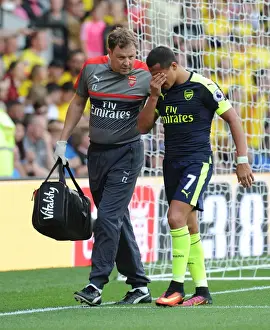 Watford V Arsenal 2016-17 Prints: Arsenal Physio Colin Lewin with Alexis Sanchez (Arsenal)