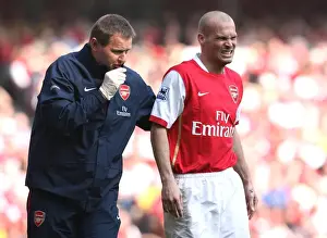 Arsenal physio Gary Lewin treats Freddie Ljungberg