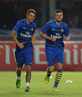 Indonesia Dream Team V Arsenal 2013-14 Prints: Arsenal Players Aaron Ramsey and Carl Jenkinson Warm Up Ahead of Indonesia All-Stars Match