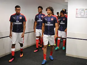 Lens V Arsenal 2016-17 Prints: Arsenal Players Alex Iwobi and Mohamed Elneny Pre-Match Huddle at RC Lens, 2016