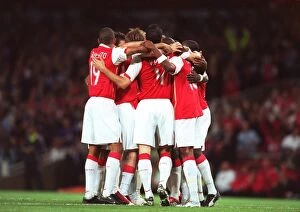 The Arsenal players celebrate the 2nd goal scored by Alex Hleb