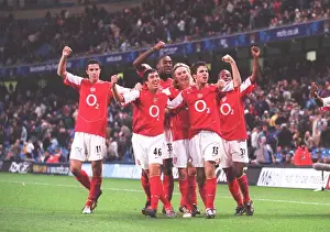 The Arsenal players celebrate the 2nd goal scored by Danny Karbassiyoon
