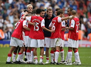 The Arsenal players celebrate after the match