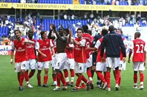 The Arsenal players celebrate after the match