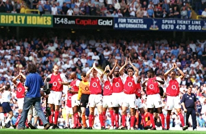 The Arsenal players clap the fans before the match. Tottenham Hotspur v Arsenal