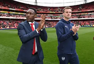 Arsenal Players Danny Welbeck and Rob Holding Celebrate with Fans after Victory over Brighton & Hove Albion