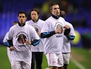 Everton v Arsenal 2011-12 Collection: Arsenal Players Honor Fabrice Muamba with Warm-Up Tribute Ahead of Everton Clash (2012)