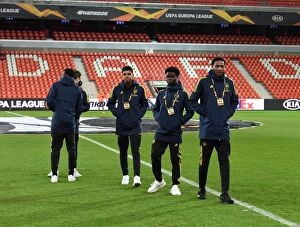 Images Dated 13th December 2019: Arsenal Players Inspect Standard Liege's Pitch Ahead of UEFA Europa League Match