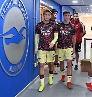 Brighton And Hove Albion V Arsenal 2021-22 Prints: Arsenal Players Kieran Tierney and Martin Odegaard Warm Up Ahead of Brighton & Hove Albion Clash