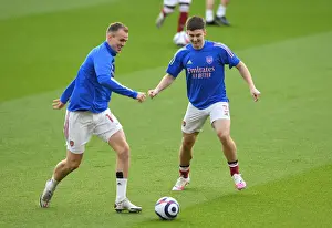 Arsenal V Manchester City 2020-21 Prints: Arsenal Players Kieran Tierney and Rob Holding Warm Up Ahead of Emirates Showdown