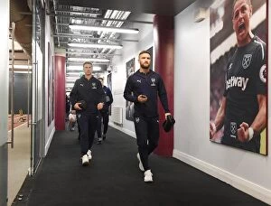 West Ham United v Arsenal 2018-19 Collection: Arsenal Players Laurent Koscielny and Shkodran Mustafi Heading to Changing Room before West Ham