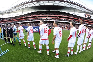 Arsenal players line up before the match wearing Aaron Ramsey shirts. Arsenal 3:1 Burnley Arsenal players line up before the match wearing Aaron Ramsey shirts. Arsenal 3:1 Burnley