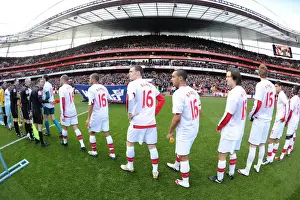 Arsenal players line up before the match wearing Aaron Ramsey shirts. Arsenal 3: 1 Burnley