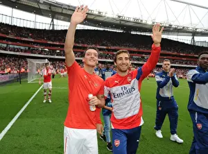 Arsenal V West Bromwich Albion 2014/15 Prints: Arsenal Players Mesut Ozil and Mathieu Flamini Waving to Fans after Arsenal vs