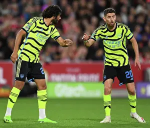 Arsenal Players Mohamed Elneny and Jorginho Strategize during Brentford vs Arsenal Carabao Cup Match, 2023-24