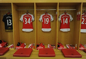 Arsenal V Norwich City 2015-16 Prints: Arsenal Players Ospina, Coquelin, Cazorla, and Walcott Gear Up in Changing Room (2015-16)
