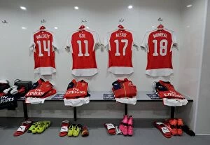 Tottenham Hotspur v Arsenal Capital One Cup 2015/16 Collection: Arsenal Players Prepare for Battle: Tottenham Showdown in Capital One Cup