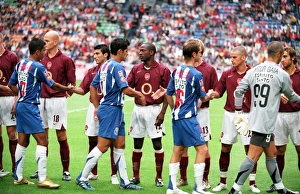 The Team Collection: Arsenal players shake hands with the Porto players. Arsenal 2: 1 Porto