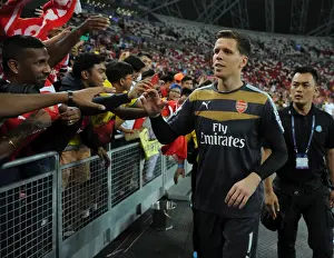 Arsenal V Singapore XI Prints: Arsenal Players Sign Autographs after Arsenal v Singapore XI Match, 2015
