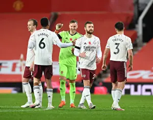 Manchester United V Arsenal 2020-21 Prints: Arsenal Players Unite at Old Trafford Amidst Empty Stands - Manchester United vs Arsenal