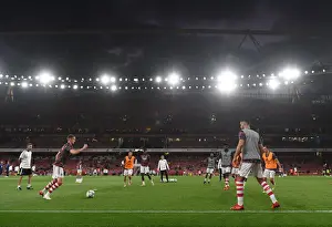 Arsenal Players Warm Up Ahead of Carabao Cup Clash Against AFC Wimbledon