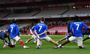 Arsenal Players Warm Up in David Rocastle Kits Before Arsenal vs. Liverpool (2020-21)